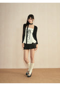 Cardigan + camisole + short skirt three-piece set
